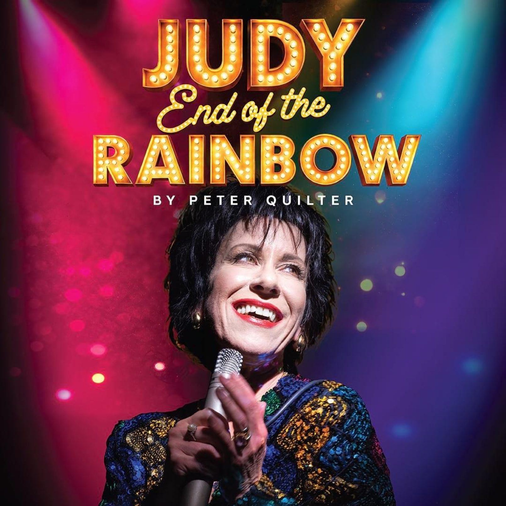 Promotional poster for "Judy: End of the Rainbow" by Peter Quilter, featuring a smiling woman holding a microphone under colourful stage lights.