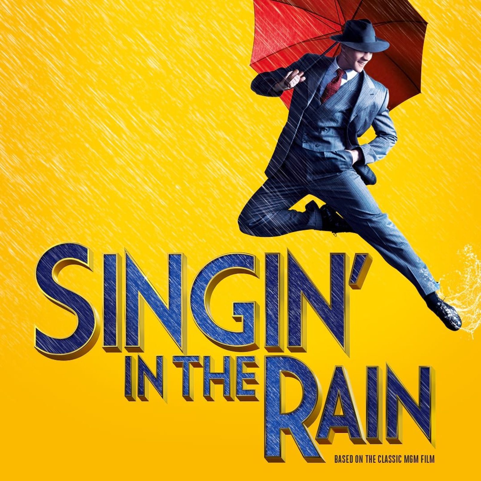A person in a suit joyfully leaps with a red umbrella on a rainy backdrop. Bold text below reads "Singin' in the Rain," conveying excitement and nostalgia.