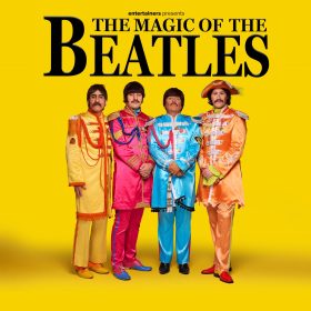 Four men in colourful Sgt. Pepper-style uniforms stand against a bright yellow background. Bold text above reads, "The Magic of the Beatles."