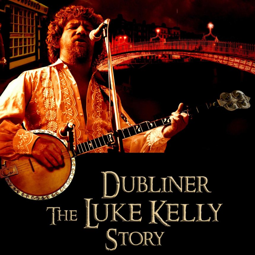 A musician passionately plays a banjo on stage. He wears an embroidered shirt and sings into a microphone. Background: Dublin bridge at night. Text: "Dubliner: The Luke Kelly Story."